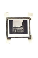 Framed sepia-toned cityscape