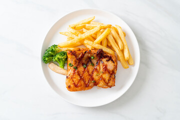 grilled chicken steak with potato chips or french fries