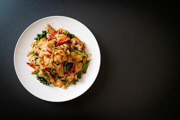 stir fried holy basil with fish and herb