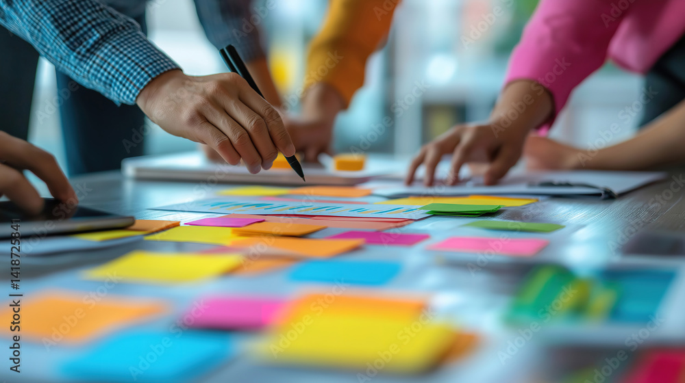 Poster close-up view of business team aligning on goals and objectives to achieve success through teamwork