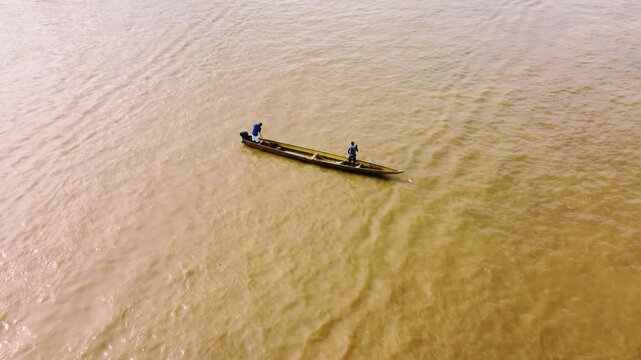 Aerial Majesty of Quibd&oacute;: River, Faith, and Rainforest. Drone views of Quibd&oacute;, Choco, Colombia, featuring the Atrato River, boats, rainforest, and the iconic cathedral. A vibrant mix of nature.