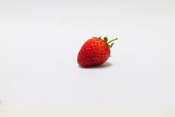 Fresh strawberry close-up kitchen table food photography bright environment top angle healthy eating concept
