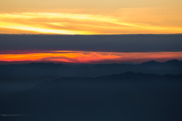 Stunning sunset over mountains nature landscape scenic viewpoint tranquil evening atmosphere vibrant colors