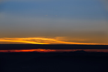 Stunning sunset over mountain ridge nature landscape vibrant colors tranquil environment scenic viewpoint evening serenity