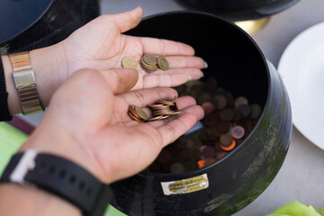 Charitable donation event community center photography indoor close-up view generosity in action