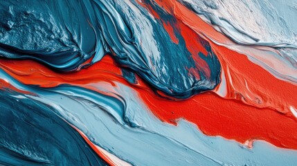 Obraz premium An abstract painting showcasing vibrant swirls of blue, red, and gray hues.