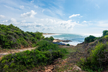 Rugged sweeping coastline of Bundala National Park leading to distant horizon