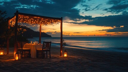 Obraz premium Romantic Beach Dinner Under the Stars: An Enchanting Sunset Getaway