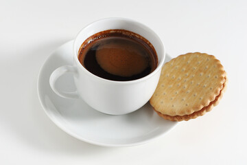 Coffee and sandwich cookie