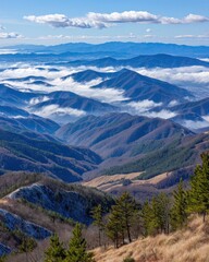 A breathtaking vista of a mountain skyline disappea into a soft blue mist, showcasing a minimal landscape with transparent background views.