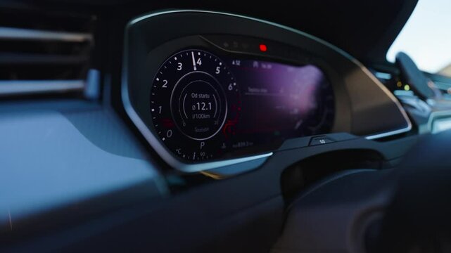 Digital dashboard display showing tachometer reading in car interior, Czechia