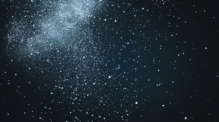 A close-up view of light particles scattered against a dark background.