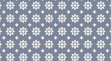 Seamless vector pattern featuring delicate white floral elements against slate gray, perfect for textile, packaging, and wallpaper design