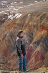 guy against the backdrop of Martian mountains
