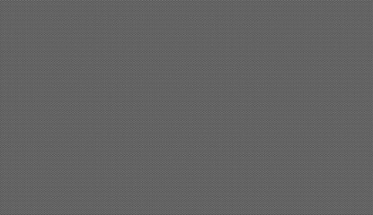 Close up view of a dark gray synthetic fiber textile surface, creating a repeatable geometric pattern, ideal for backgrounds and textures