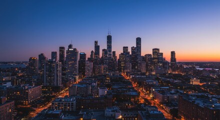 Obraz premium City Skyline at Dusk with Illuminated Buildings