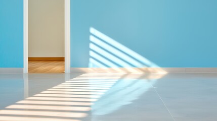 Obraz premium Interior light and shadow patterns on a blue wall