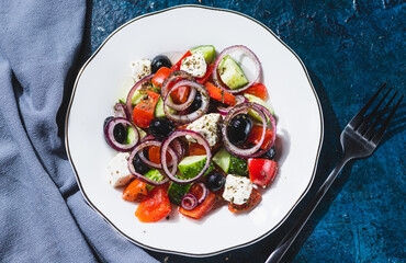 Greek salad in a white plate