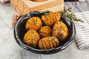 Baked baby potato with thyme