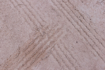 Tire tracks in sandy ground outdoor environment landscape photography abstract conceptual view