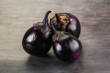Raw violet and black eggplant