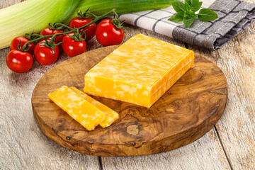 Marble yellow cheese with slices