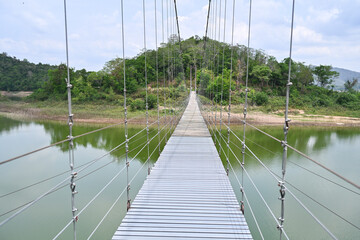 Suspension bridge over the river
