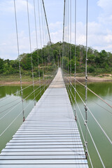 Suspension bridge over the river