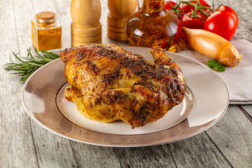 Baked in oven whole chicken with spices