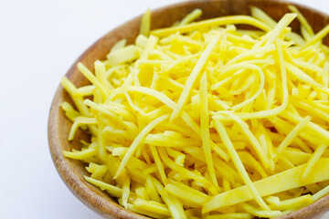 Ginger chopped on white background.