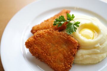 Fried fish with mashed potatoes