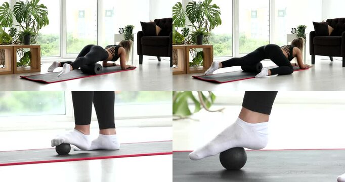 Calf fascia massage with ball for self-massage. Ball to roll out calf muscles. Myofascial release. Woman in sportswear performs a myofascial massage of the inner thigh with a roller. Mfr.  