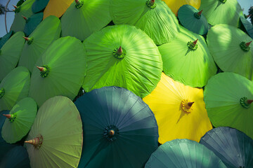 Multi-colored umbrellas are lined up.