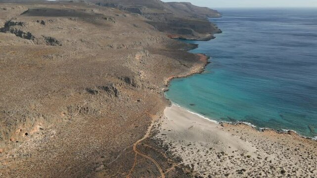 Isolated Alona Beach Near Zakros Crete Greece Drone Pull Back 4K 60FPS
