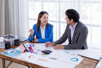 Business finance accounting banking concept. Business hand doing finances and calculate on desk about cost at office. Two Business working on desk with using calculator, finance accounting.