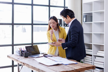  Asian business team creative businesspeople coworker in office Happy to be successful partnership teamwork celebrating achievement and success concept.
