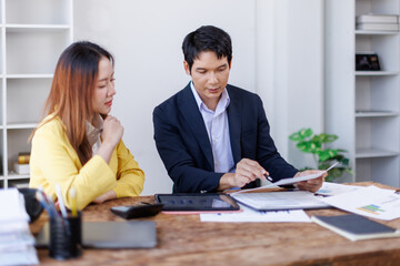 Financial Business team analyze the graph of the company's performance to create profits and growth, Market research reports and income statistics, Financial and Accounting concept.