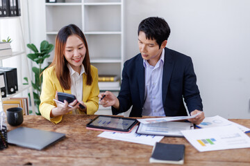 Financial Business team analyze the graph of the company's performance to create profits and growth, Market research reports and income statistics, Financial and Accounting concept.