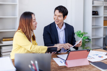 Financial Business team analyze the graph of the company's performance to create profits and growth, Market research reports and income statistics, Financial and Accounting concept.