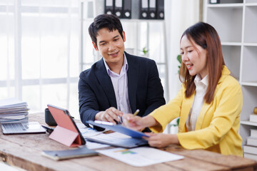 Financial Business team analyze the graph of the company's performance to create profits and growth, Market research reports and income statistics, Financial and Accounting concept.