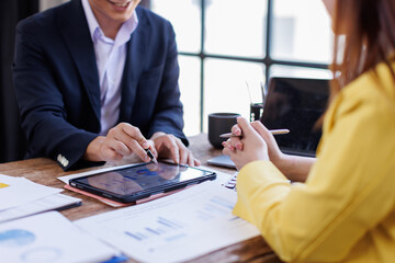 Team Business financing accounting banking concept. Business woman hand doing finances and calculate on desk about cost at home office. Woman working on desk with using calculator, finance accounting.