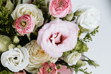 Beautiful floral arrangement with various blossoms in soft colors for decoration