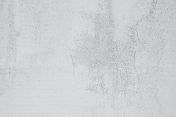 Smooth light gray concrete wall texture with subtle imperfections and shadows