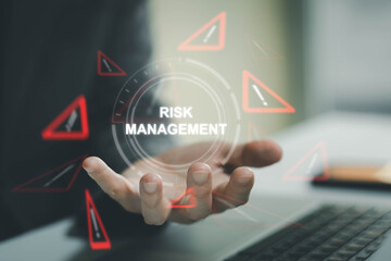 close up with hand of business person identify danger risk with AI among normal incident. Risk...