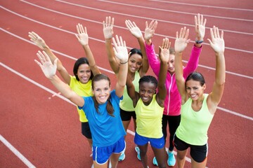 Group of female runners enjoying victory