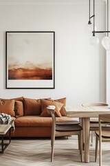 A contemporary living room with an orange couch, wooden dining table and a framed abstract landscape