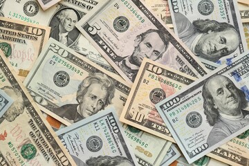 Stack of dollar bills. Hundred, fifty, twenty, ten, five dollars banknote close up