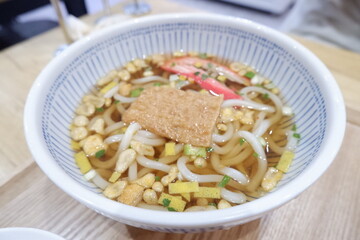 Delicious noodle soup in a bowl closeup view