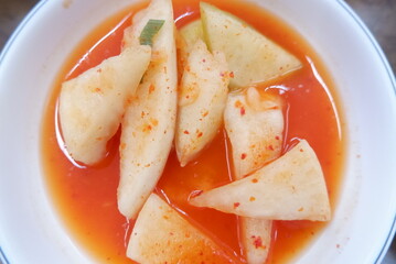 Spicy pickled vegetables in a bowl closeup view