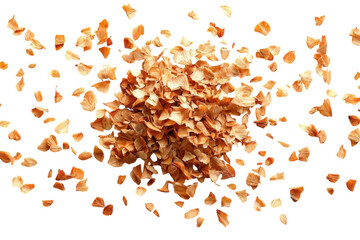 Dried flower petals explode in mid air a burst of warm autumnal colors against a stark black on transparent background